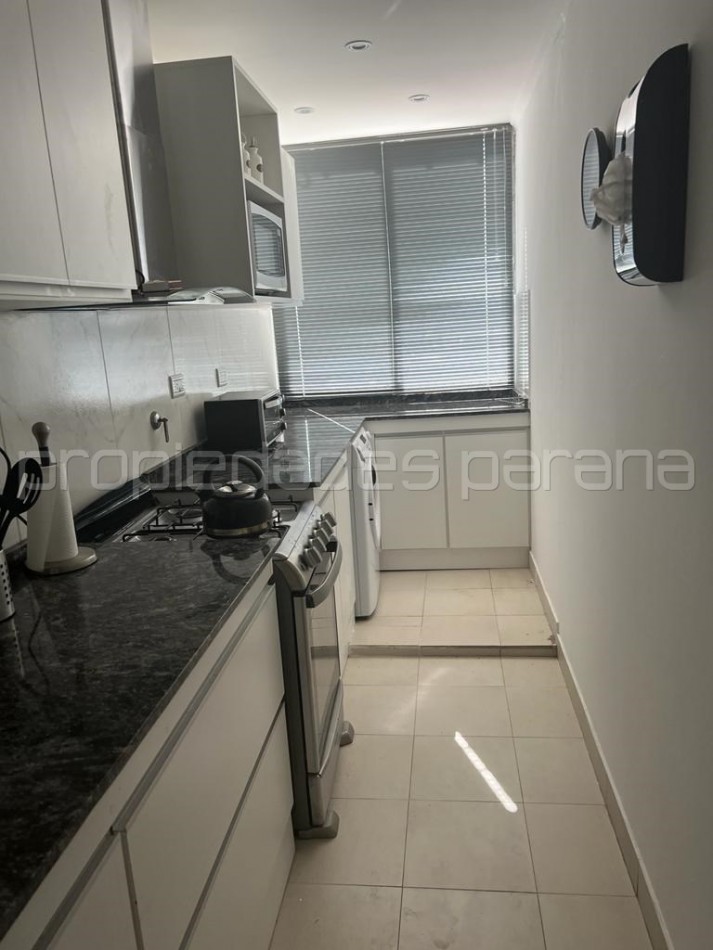 VENDO IMPECABLE SEMIPISO DE 2 DORMITORIOS, COCHERA Y BALCON CON VISTA AL RIO, en Zona Parque